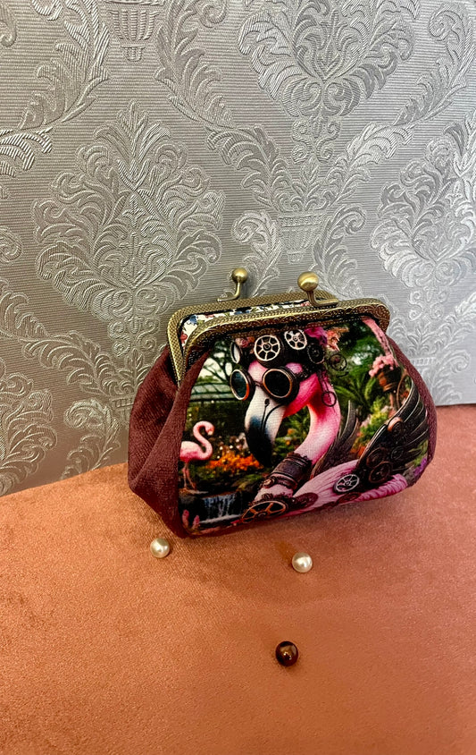 Détail soufflet velours bordeaux porte-monnaie de créateur