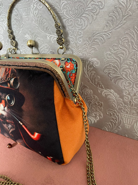 Vue de profil pochette retro velours orange Le Comptoir de Suzanne