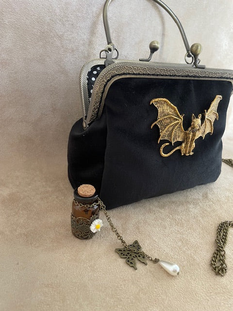 pochette chat, chat ailé