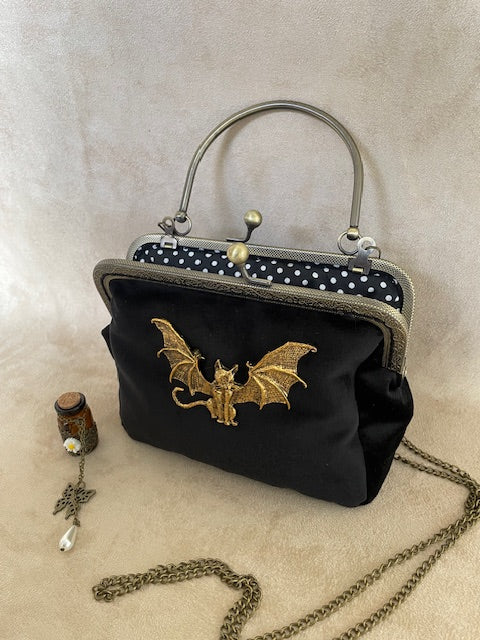 pochette chat, chat ailé