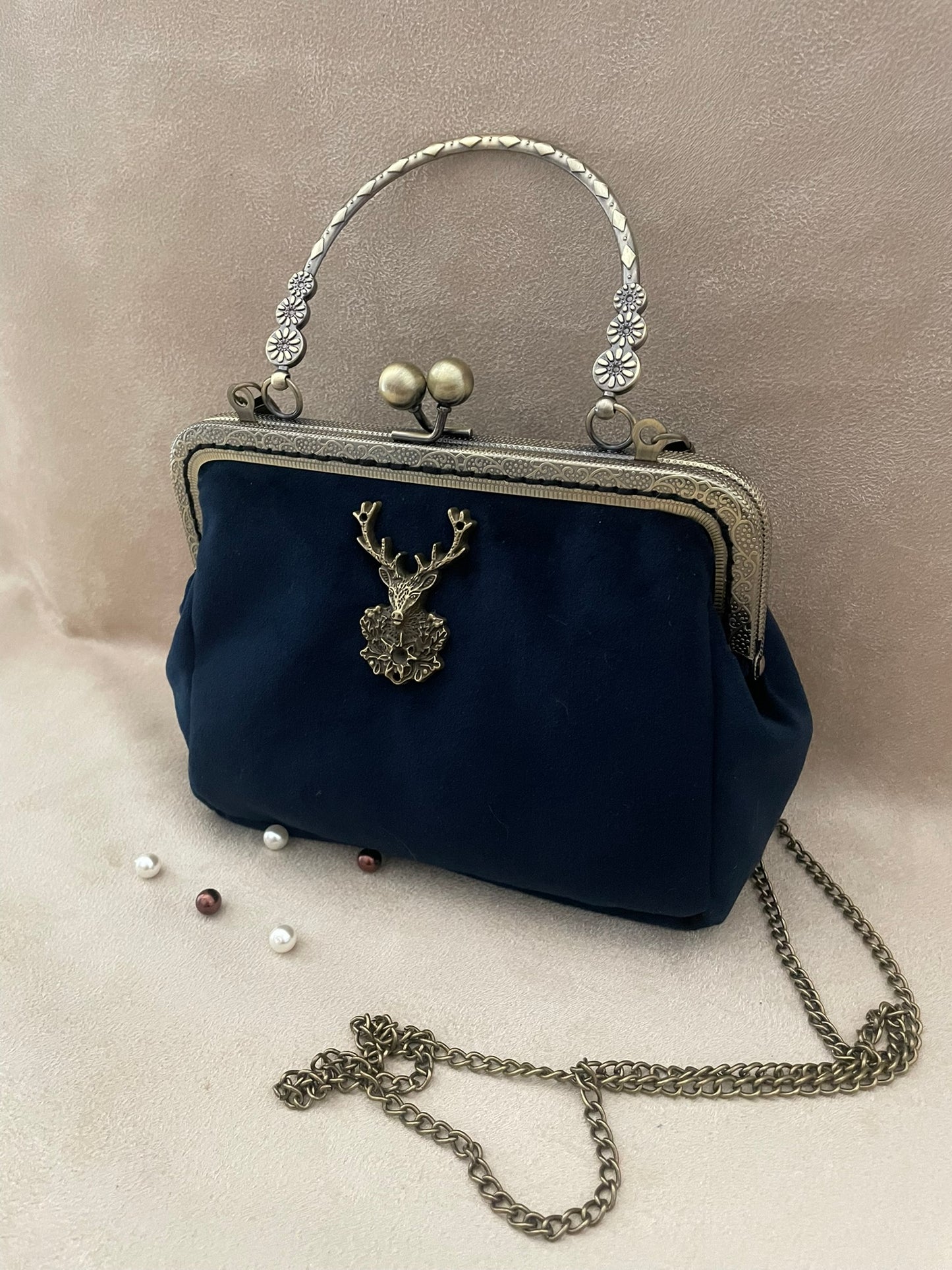 Clutch/pochette cerf