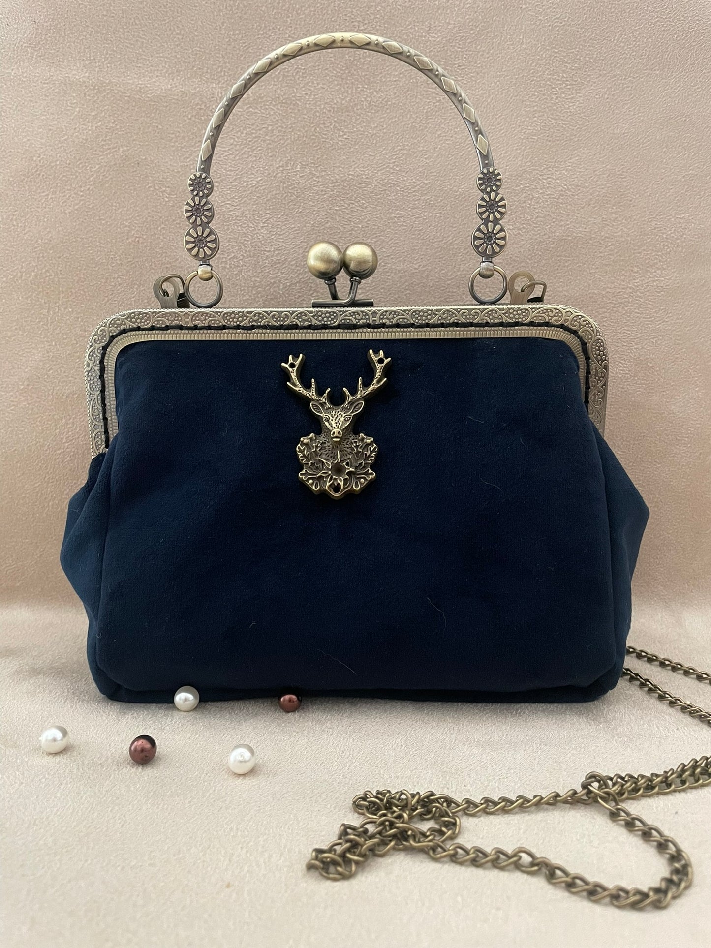 Clutch/pochette cerf