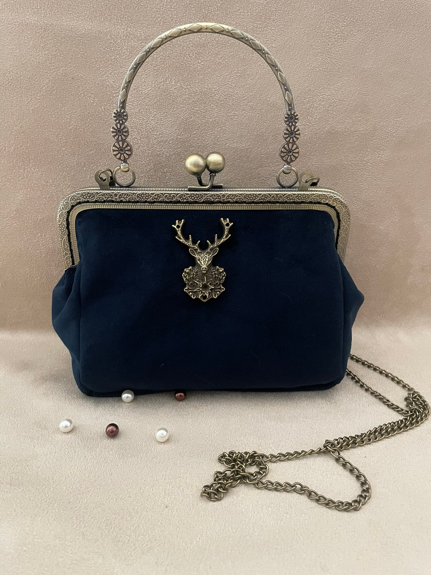 Clutch/pochette cerf